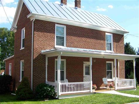 pictures of red brick houses with metal roofs|brick homes with metal roofs.